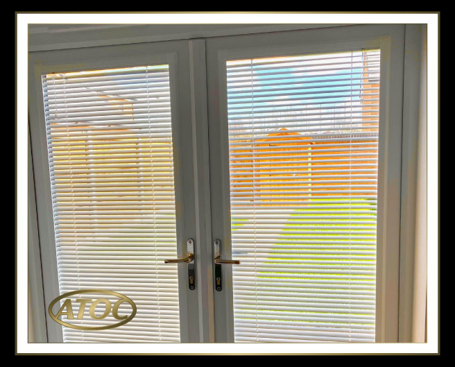 Perfect Fit clip-in blinds sitting flush within a uPVC tilt-and-turn window frame in an Essex living room