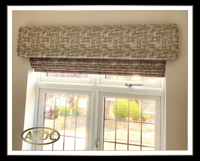 Roman blinds offering curtain-like softness and ambience in an Essex bay window bedroom